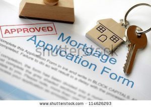 stock-photo-approved-mortgage-loan-application-with-house-key-and-rubber-stamp-114626293