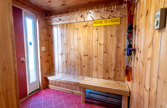 Entryway of townhome with ski racks