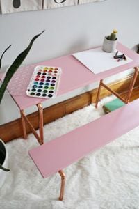 a-beautiful-mess-copper-pipe-desk