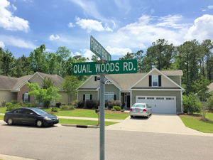 Quail Woods - Street Sign