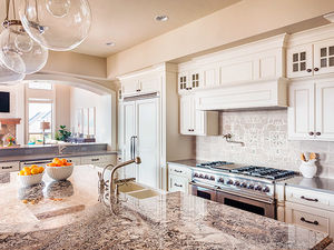 McGranite Countertops - Warmer Kitchen Granite Countertop and Patterned Backsplash