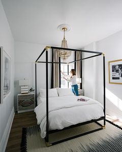 The Nest - Shelby Girard - Four-Poster Black and Gold Bed