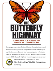 The Butterfly Highway Sign with information on the property and pollinators