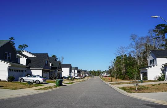 Street of homes in The Creek at Willowick