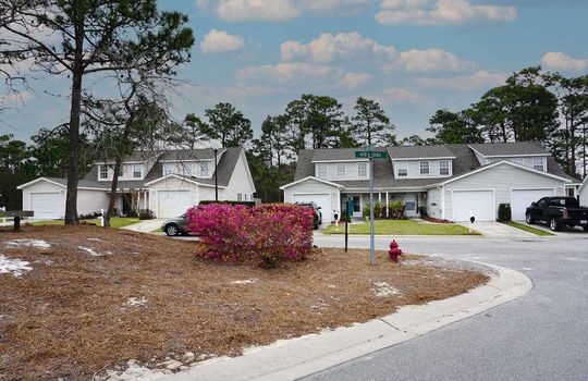 Example townhomes with light vinyl siding