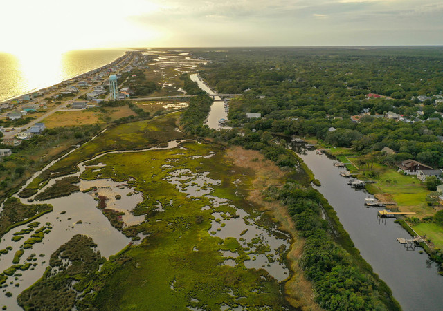 View of beach houses along the coast line at Oak Island North Carolina