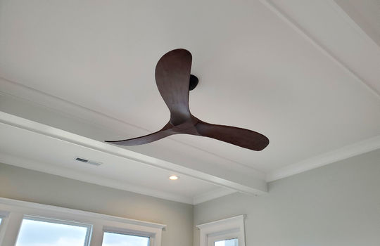 A 3-blade modern ceiling fan.