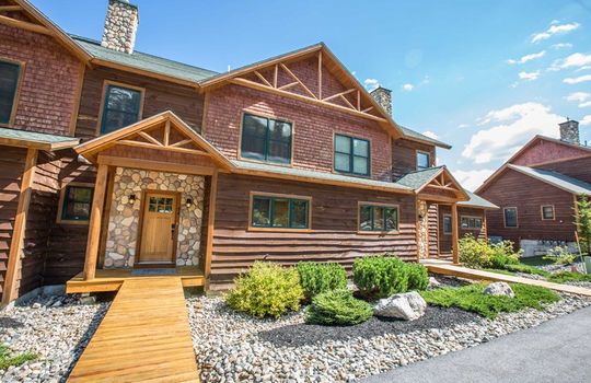 Tempest Ridge front of townhouse in summer