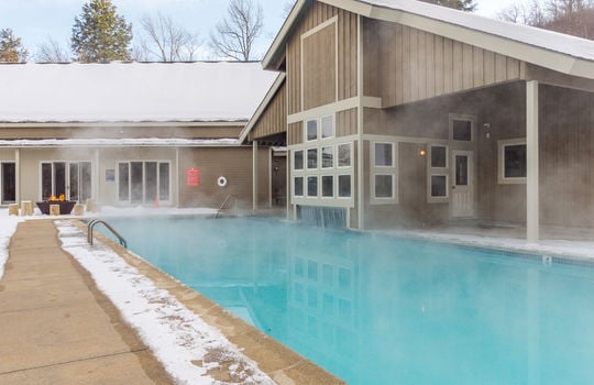 Heated outdoor pool and firepit at Locke Mountain Townhomes