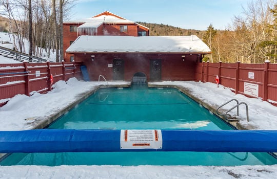 Heated outdoor pool at North Peak Condo