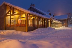 Sunday River Real Estate office in the snow at twilight