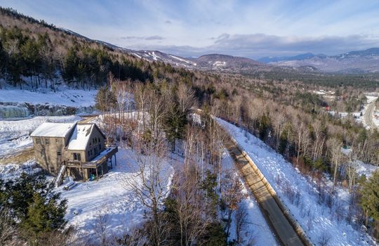 Home on Locke SUmmit with aerial view of road and Sunday River