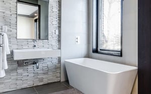 bathroom with white and grey accents
