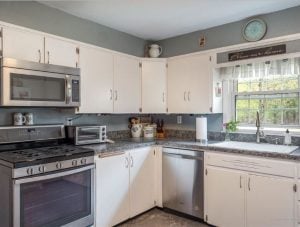 Kitchen with white cabinets