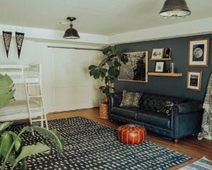Dark blue accent wall in living space