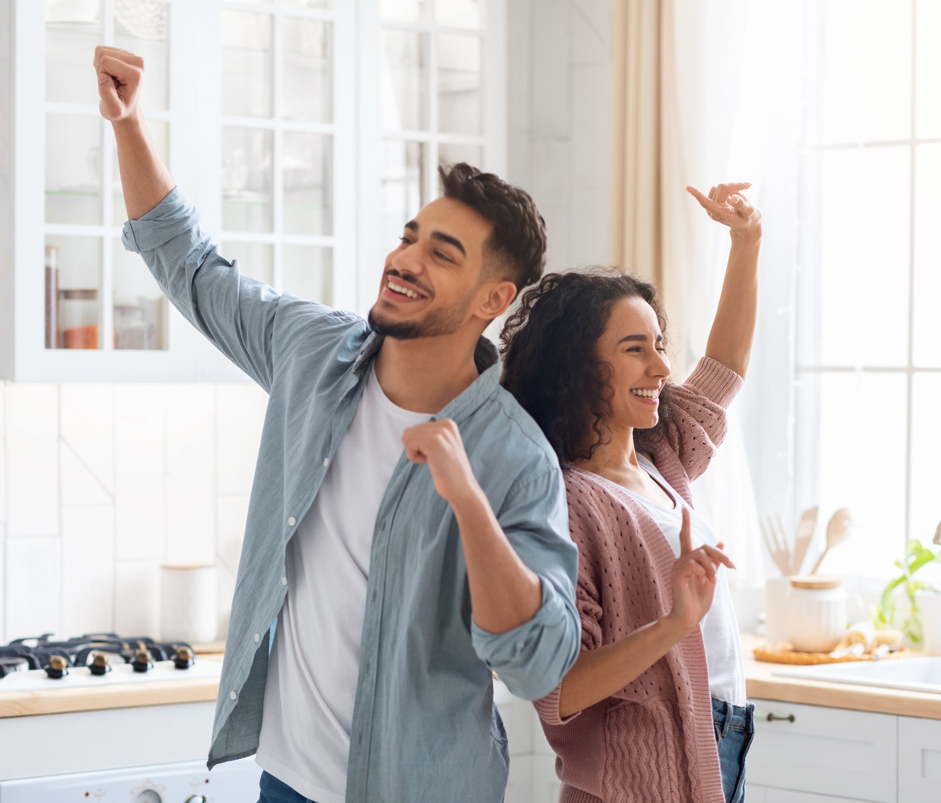 Domestic-Fun.-Cheerful-Middle-Eastern-Spouses-Dancing-In-Kitchen,-Loving-Arab-Couple-Fooling-And-Laughing-At-Home,-Young-Family-Of-Two-Enjoying-Spending-Weekend-Time-Together,-Copy-Space