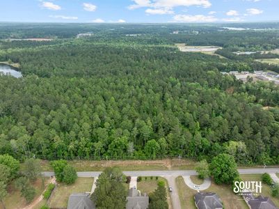 aerial view showing road frontage and timber of 23.25 acres in West Hattiesburg MS